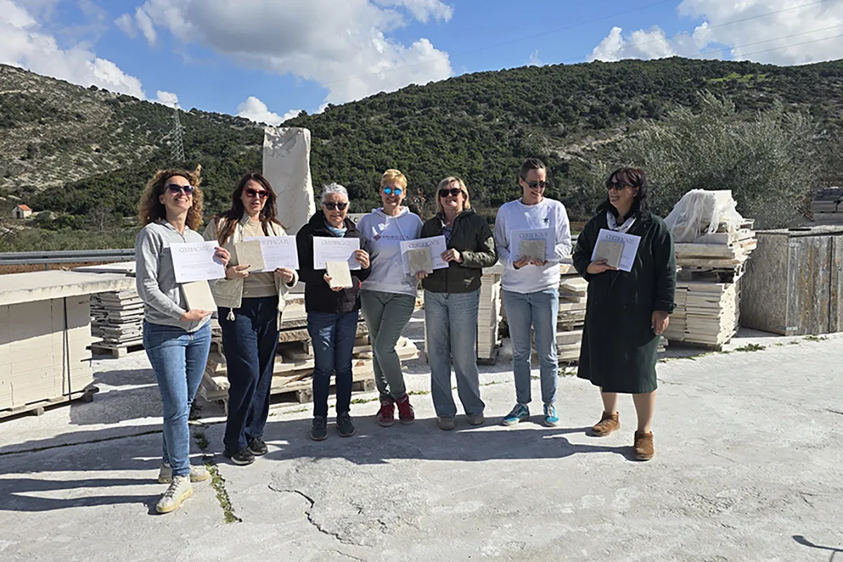 Stone carving experience on Brač – guests with their handmade stone creations